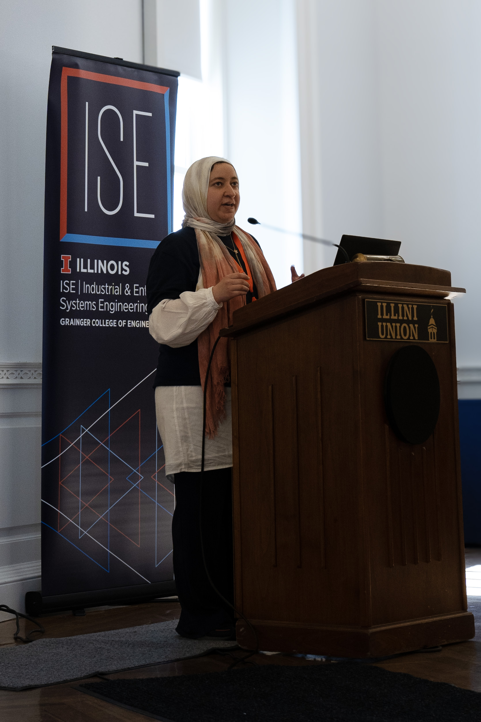 Conference Committee Member and ISE Graduate Studnet, Aya Hamed welcoming guest to the conference