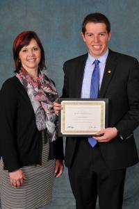 Heidi Craddock presents Andrew Kerr with the prestigious MIT Supply Chain Award.