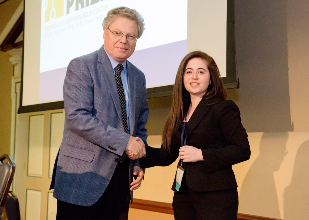 Dean Cangallaris presents Amy Doroff with the Illinois Innovation Prize