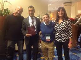 Angelia Nedić and colleagues receiving the Best Theoretical Paper Award of the 2013 Winter Simulation Conference.