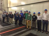 This group is at the Caterpillar plant in Decatur, Illinois where they were given the opportunity to rev the engine on one of the large machines in the plant!