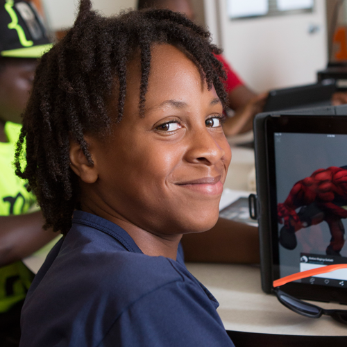 7th grade Cameron Griffin works with Computer-Aided-Design (CAD) software at ISE.