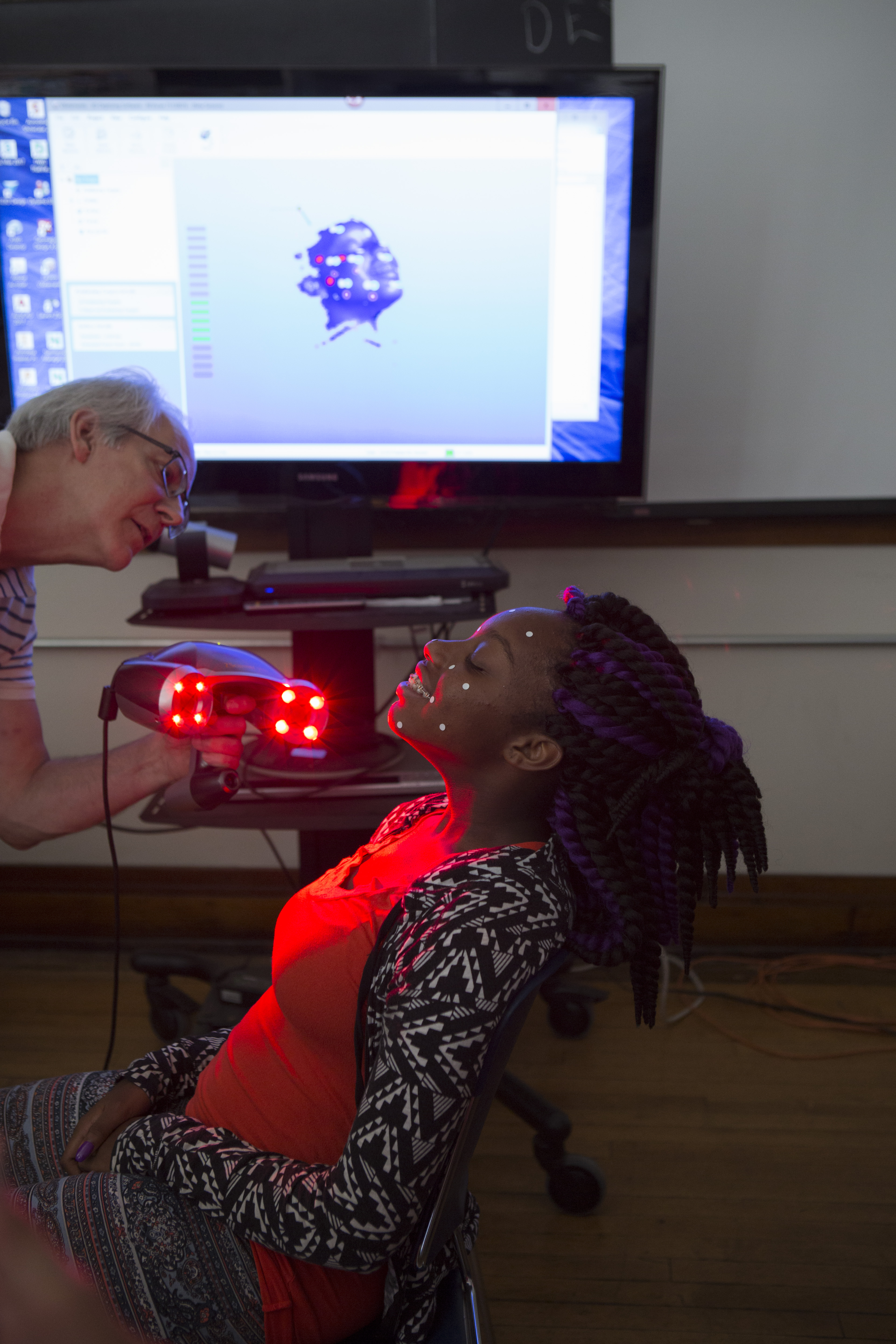 Ariana Hopkins holds still for a (painless) scanning of her face into a 3D digital model, which can then be printed in a 3D printer.