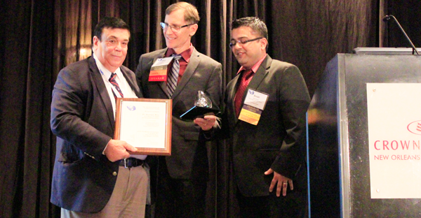 Reis in New Orleans with Dr. Gary Georgeson and Dr. Anish Poudel receiving the American Society for Nondestructive Testing's 2016 Research Award for Sustained Excellence and the Outstanding Paper Award