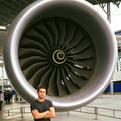 Josh in front of the Rolls-Royce engine of the third Dreamliner ever built at the Museum of Flight in Seattle during his Boeing internship. 