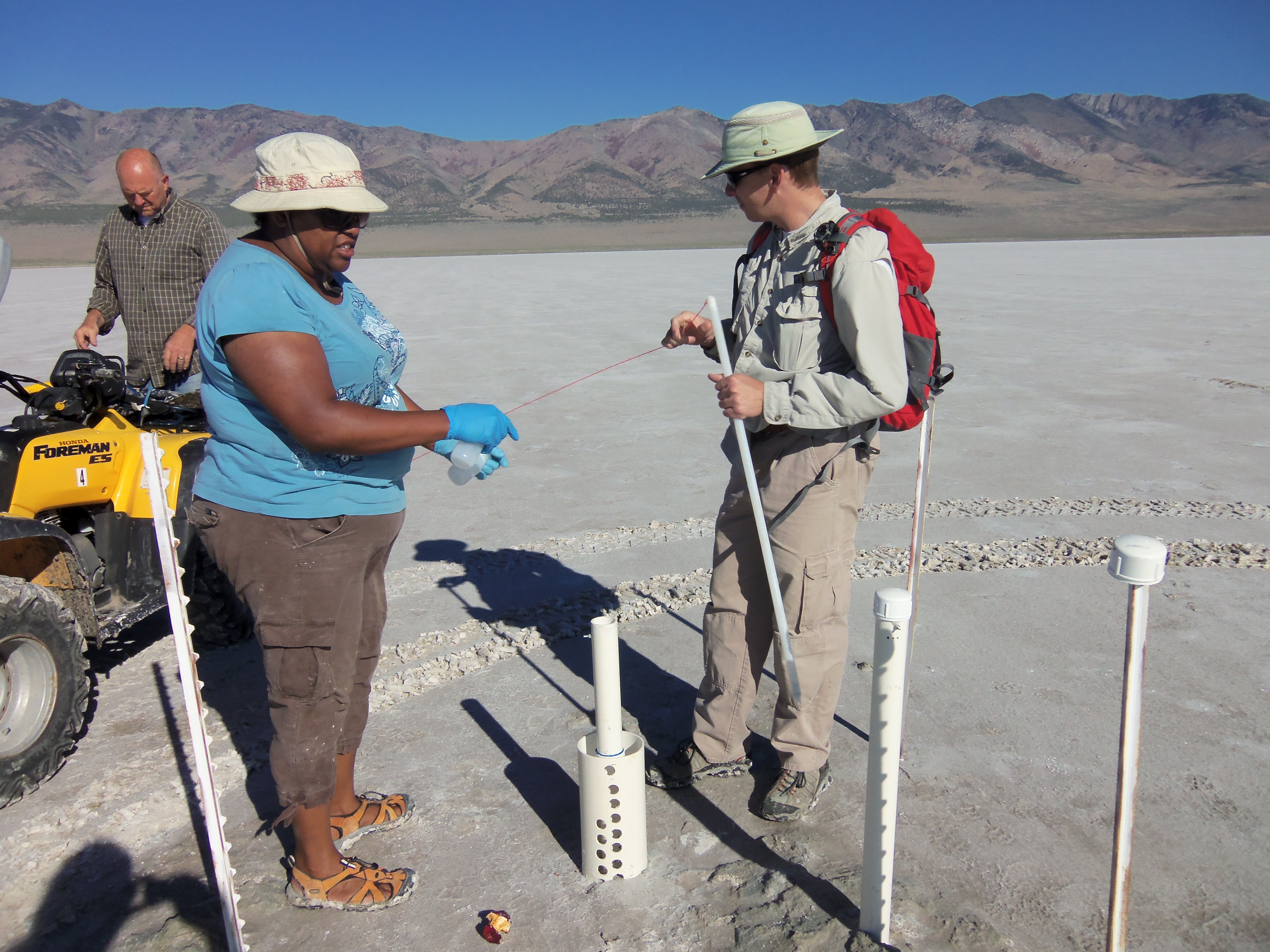 Lynch and her colleagues sampling hypersaline groundwater in the Pillot Valley Basin. Photo by Robin Schneider.