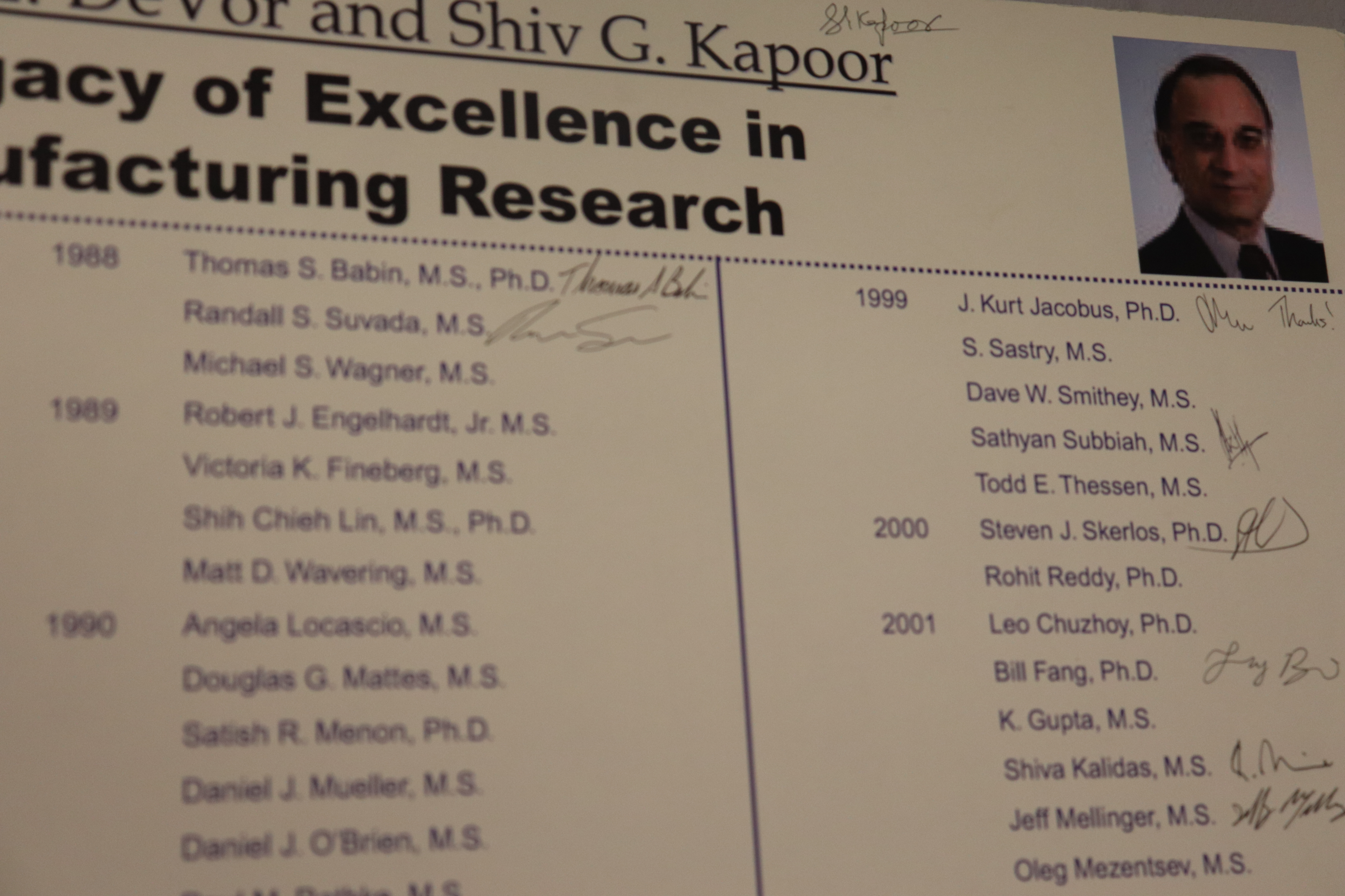 This plaque displays signatures left by graduates of Professor Kapoor and former colleague, the late Professor Richard DeVor.