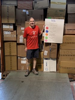Brian Eberle in front of a container loaded for the Dominican Republic.